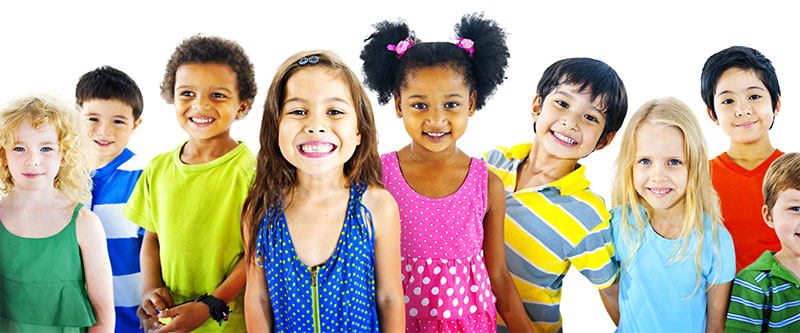 A diverse group of children and adults posing together for a photo.